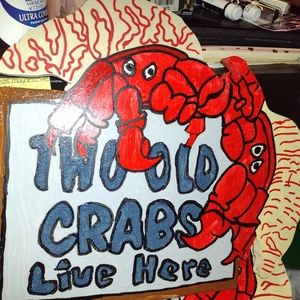 Two old Crabs live here sign